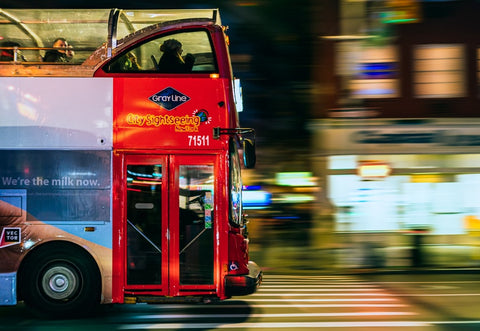 Going on a city tour bus as one of the best group activities for adults