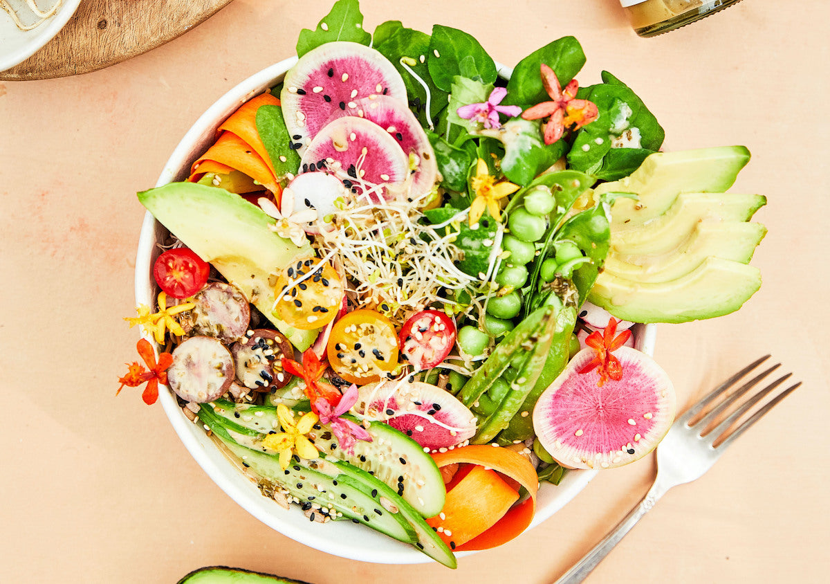 vibrant veggie salad made with Chosen Foods Lemon Garlic Dressing & Marinade