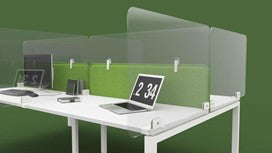 Office desks fitted with office screens to enable social distancing
