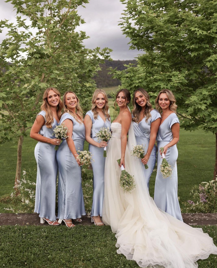 Bride Jadé Tunchy stands with her bridesmaids at her Hunter valley vineyard wedding. 