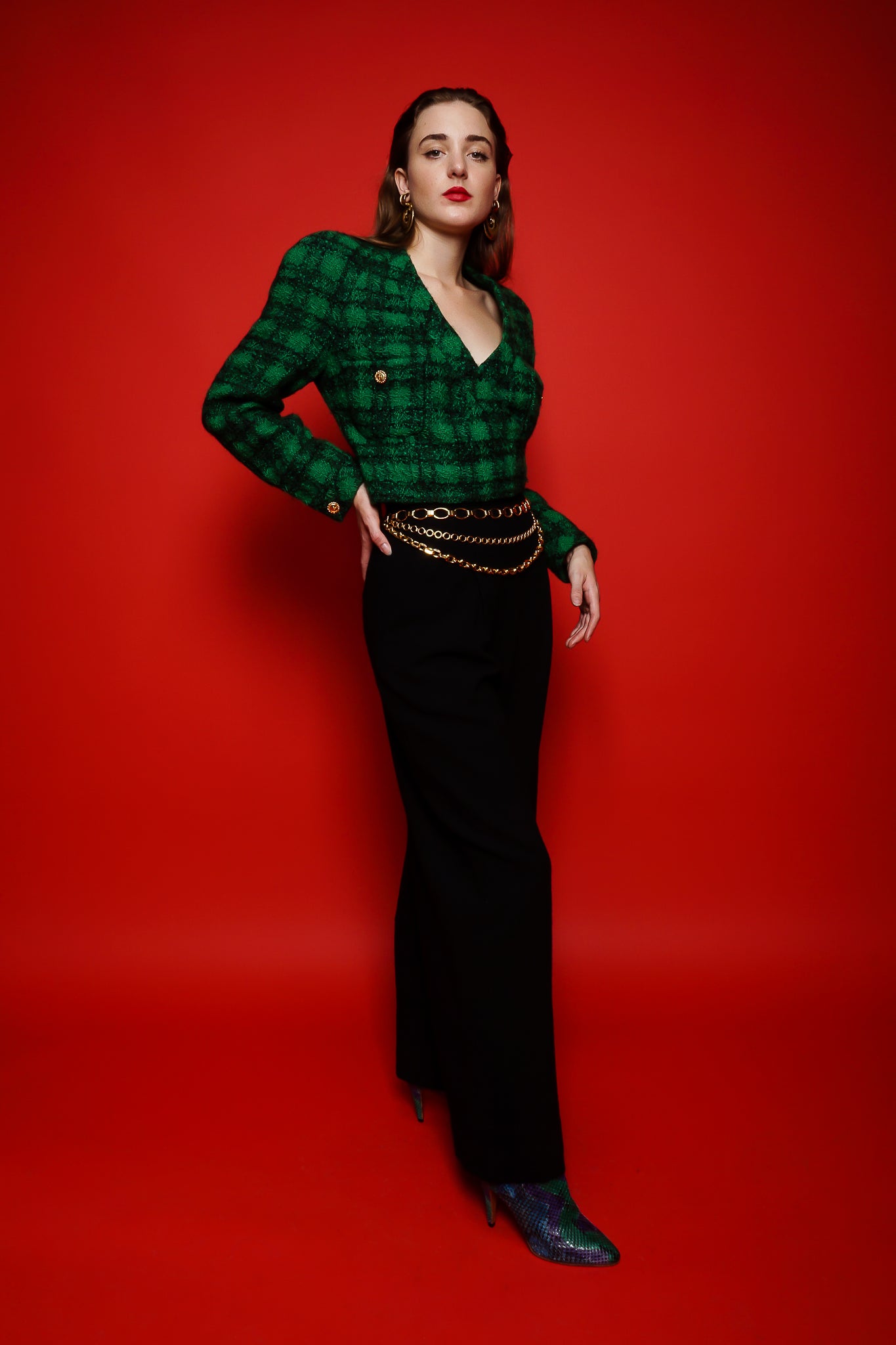 Girl in green Chanel plaid tweed wrap jacket & Todd Oldham pants on red at Recess Los Angeles
