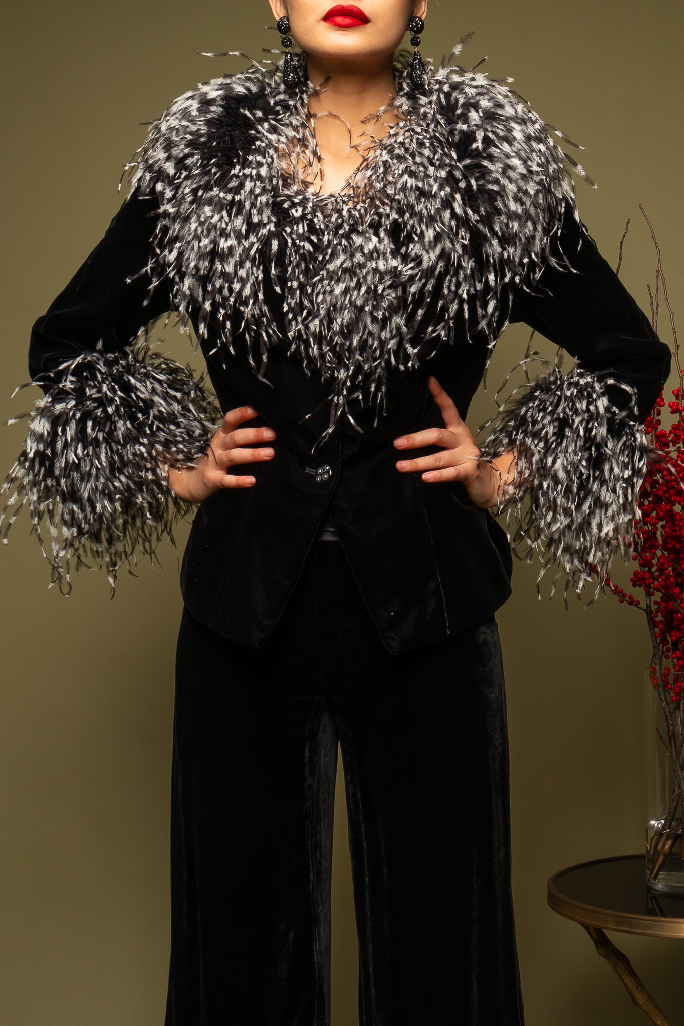 girl in Bob Mackie b&w feather jacket & Armani Collezioni pant on green @ Recess Los Angeles