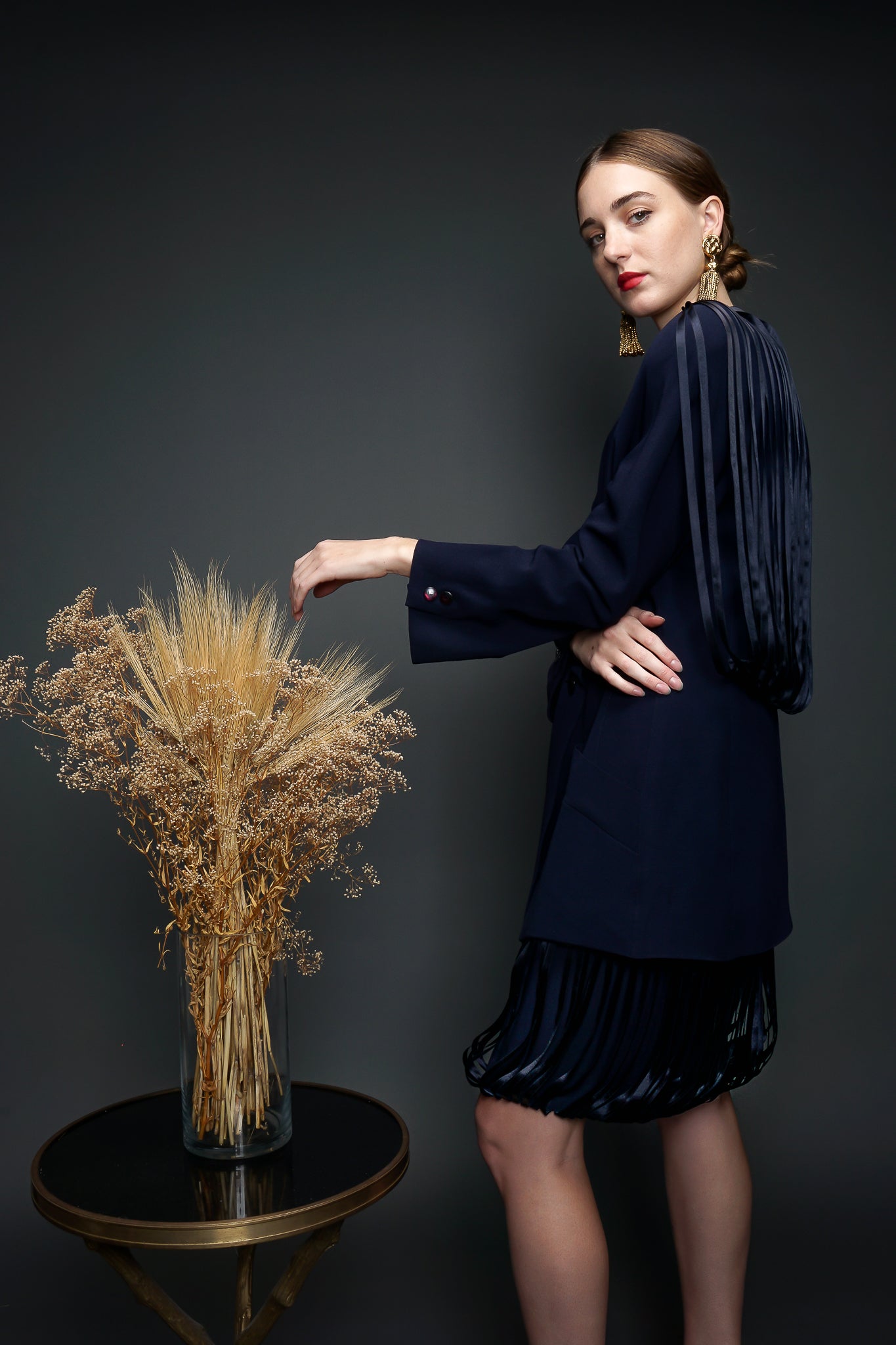 Girl in Navy Krizia Ribbon Fringe Jacket & Skirt at Recess LA Vintage Designer Consignment