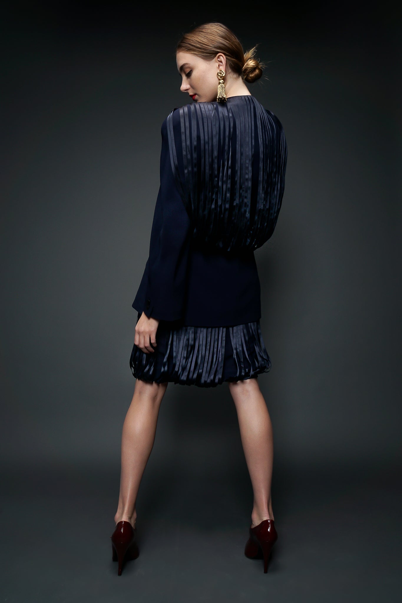 Girl in Navy Krizia Ribbon Fringe Jacket & Skirt Backside at Recess LA Vintage Designer Consignment