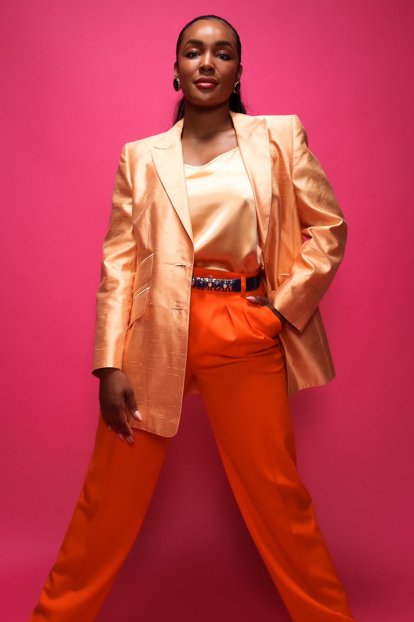 Brittany Hampton in Escada Colada Orange Sherbet Jacket  at Recess Los Angeles Designer Consignment