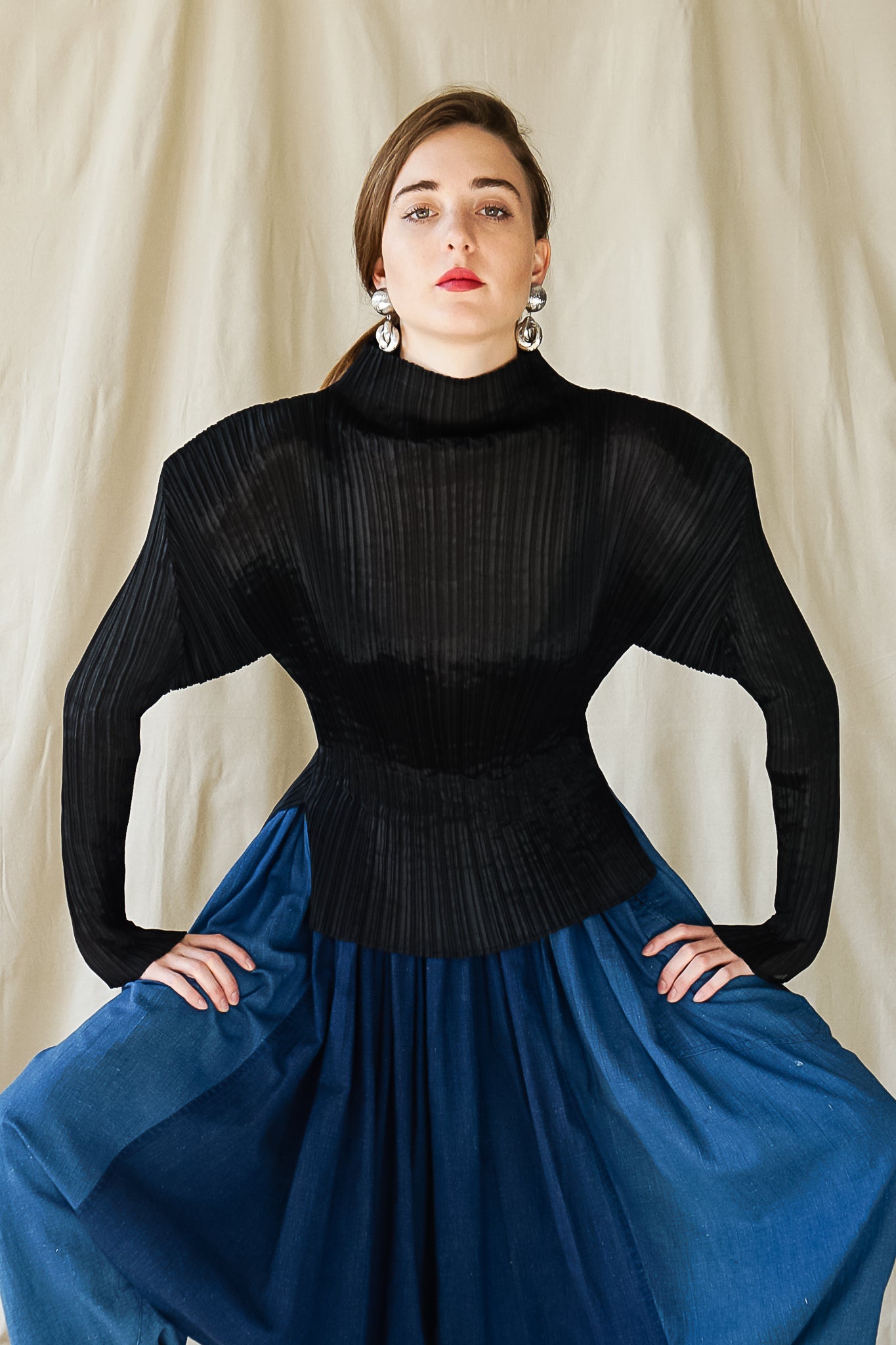Recess Vintage Consignment Girl wearing black Issey Miyake top with Plantation chambray harem pant