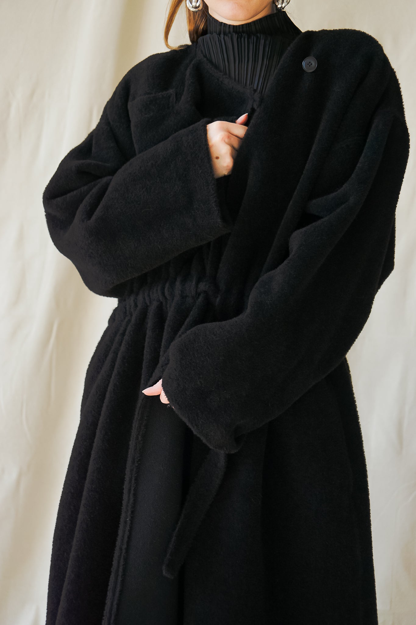 Recess Vintage LA Girl in black Issey Miyake top & Sonia Rykiel coat