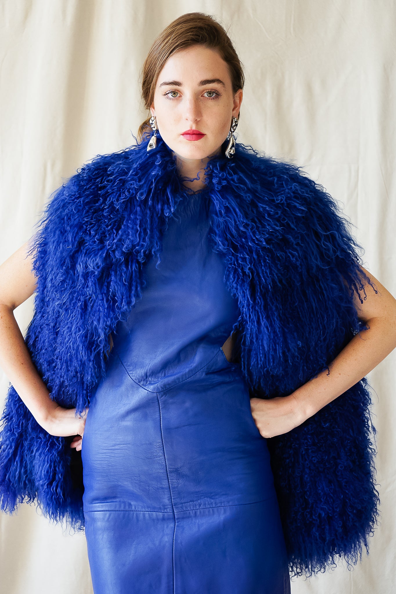 Recess Vintage Los Angeles Girl in blue Marvin Richards Mongolian Fur Vest & Climax leather dress