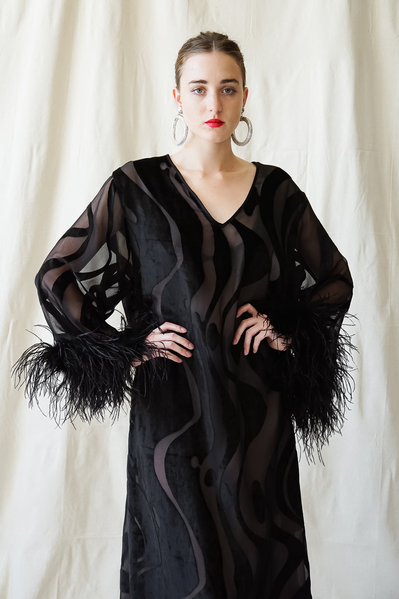 Recess Vintage Los Angeles Girl in Valentino black chiffon caftan dress w/ ostrich feather trim