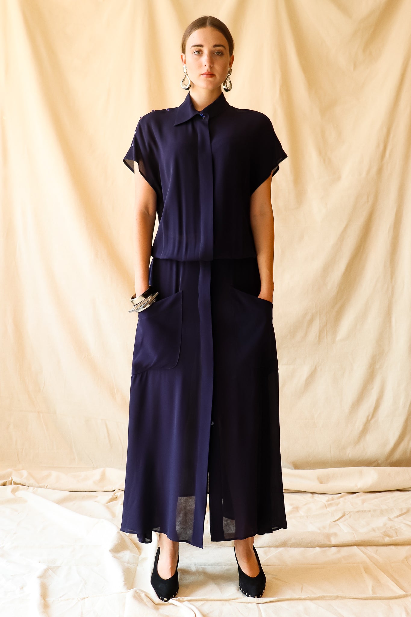 Recess Vintage Consignment LA Girl in sheer navy Karl Lagerfeld Dress