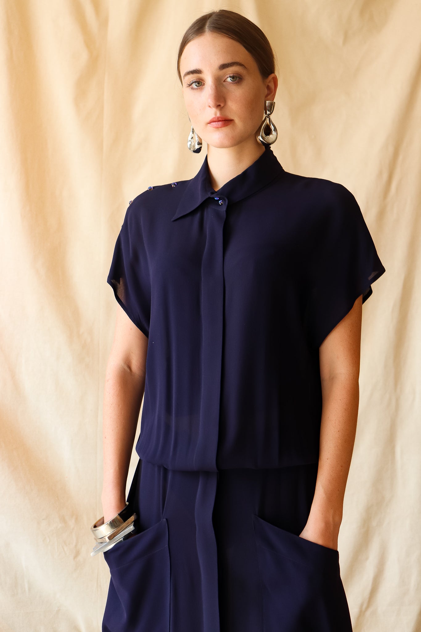 Recess Vintage Consignment LA Girl in sheer navy Karl Lagerfeld Dress