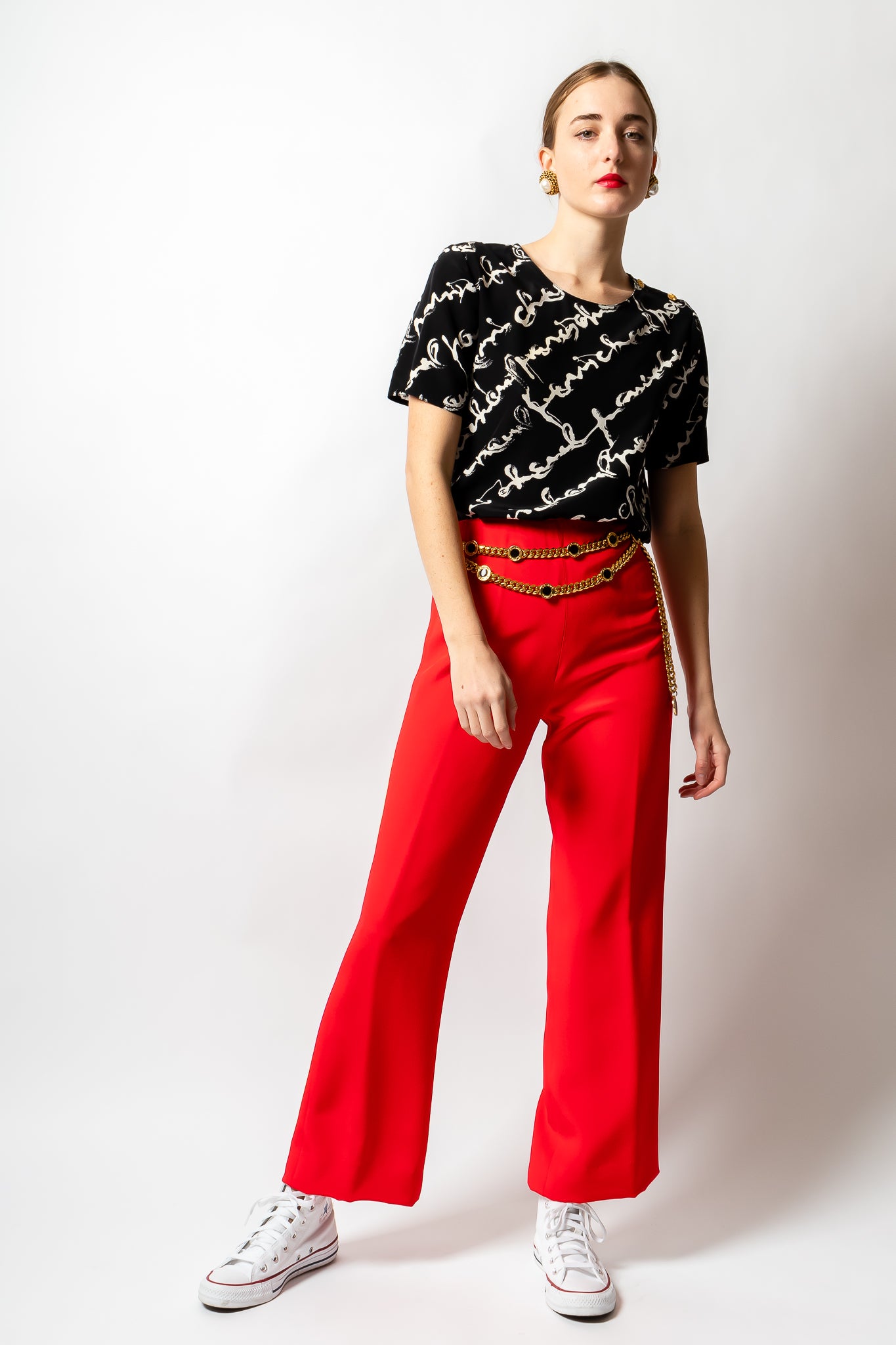 Girl wearing Chanel silk script tee shirt blouse & Oscar de la Renta red pant @ Recess LA