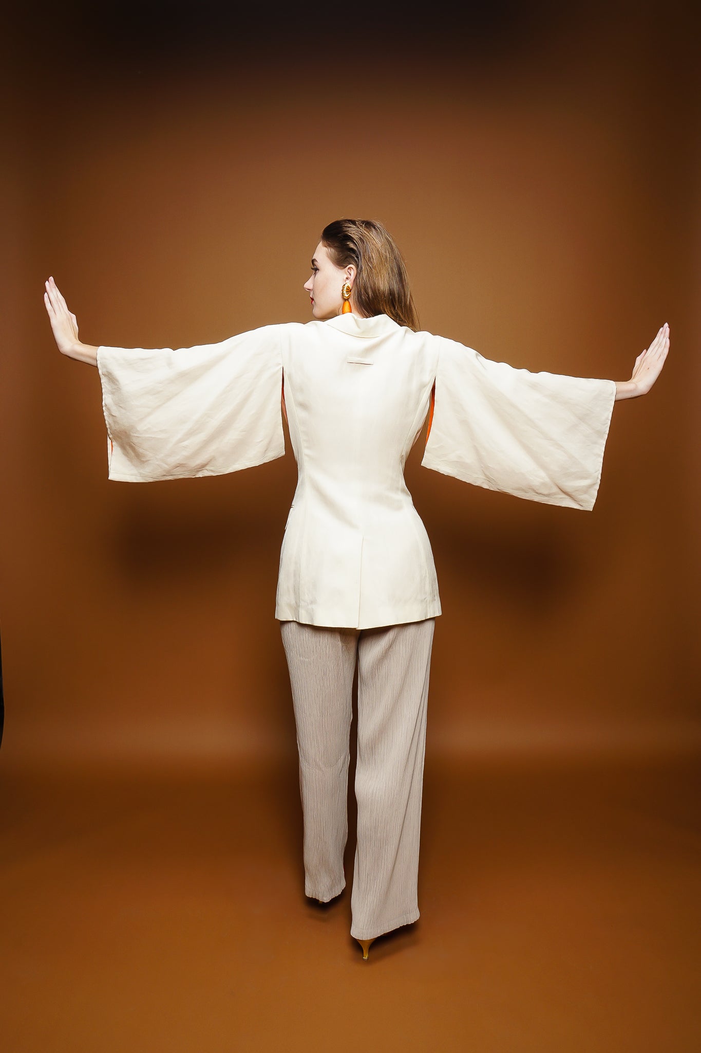 girl in Jean Paul Gaultier linen kimono jacket & Issey Miyake pant on brown @ Recess Los Angeles