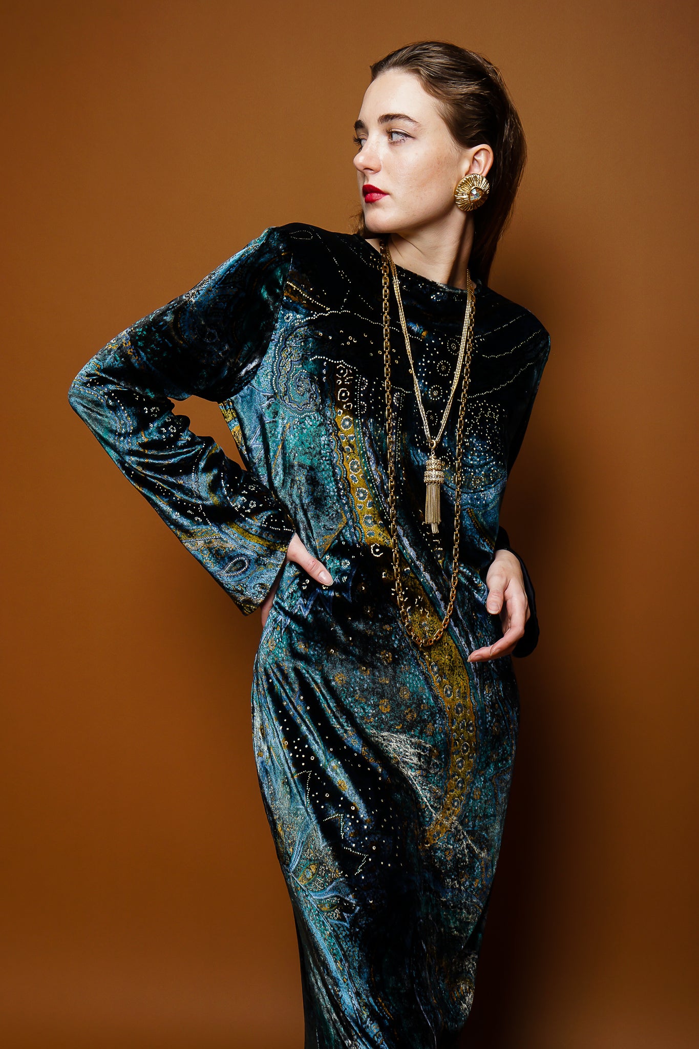 girl in YSL Saint Laurent velvet paisley galaxy gown & necklaces on brown @ Recess Los Angeles