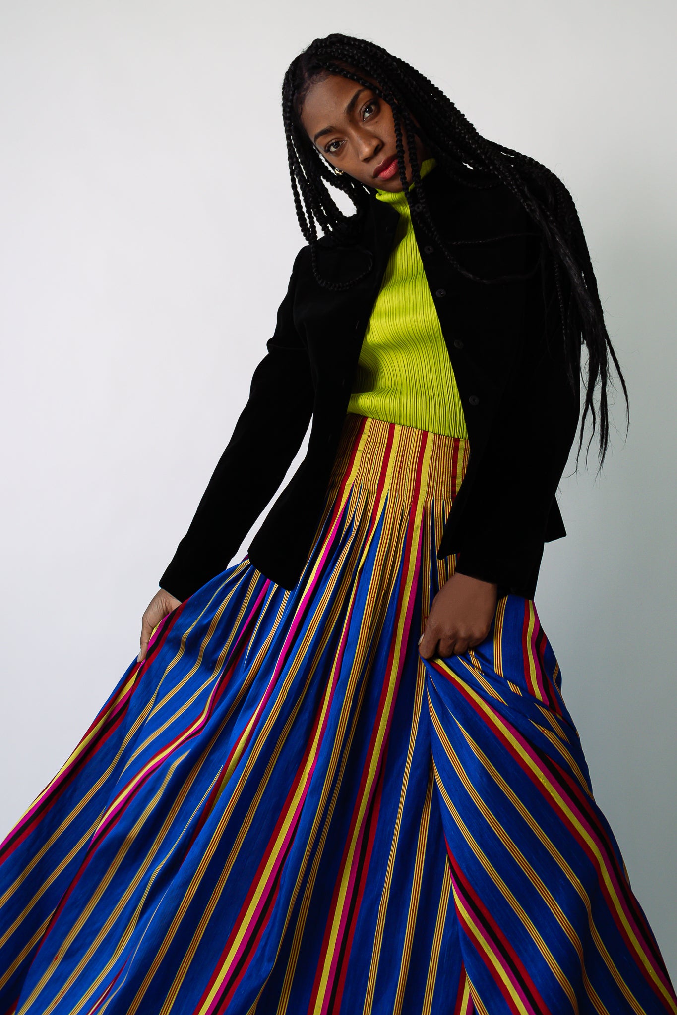 Girl in Peter Lai striped silk skirt and lime green turtleneck at Recess Los Angeles
