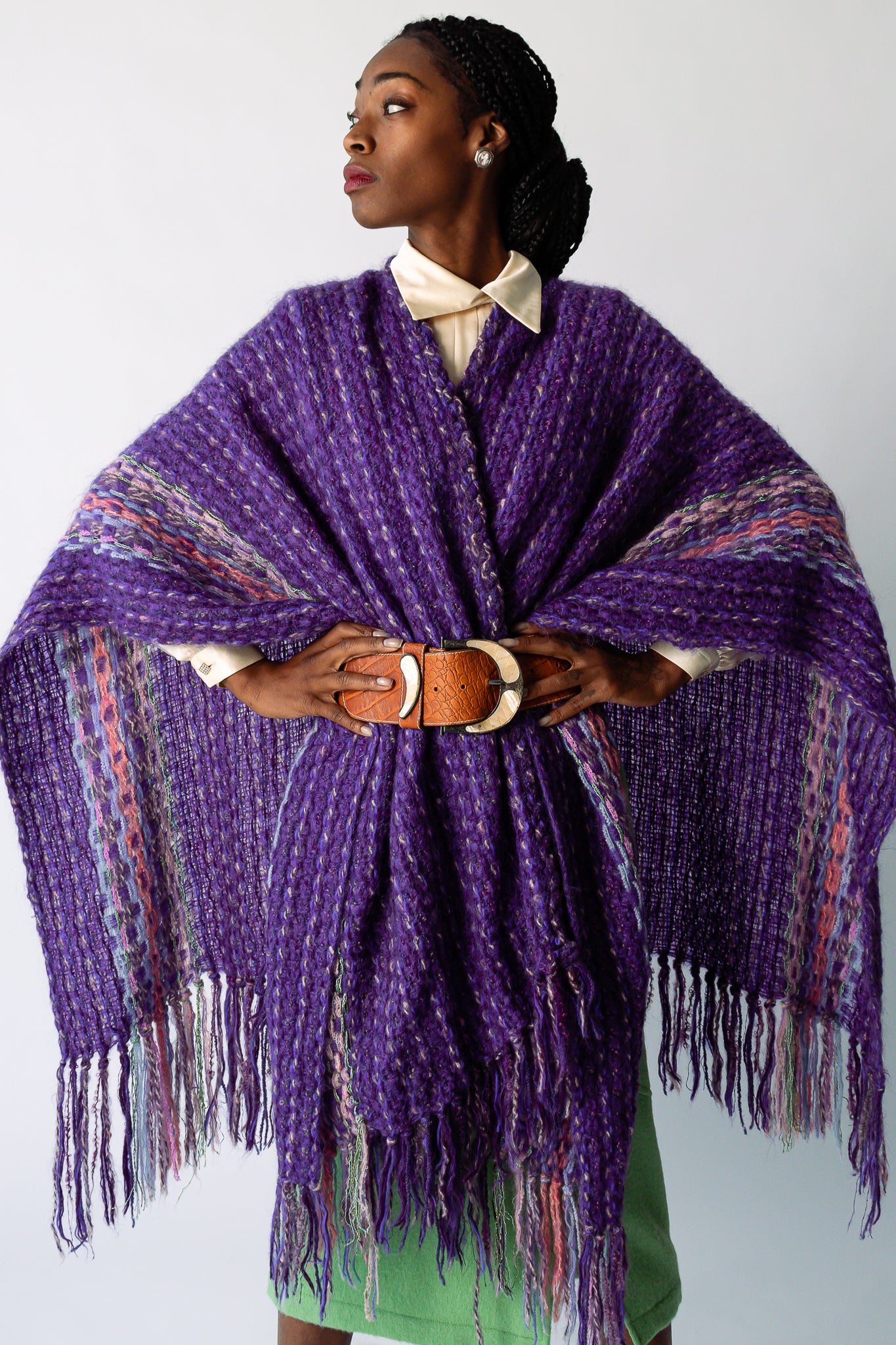 Girl wearing purple yarn shawl mint skirt and belt at Recess Los Angeles