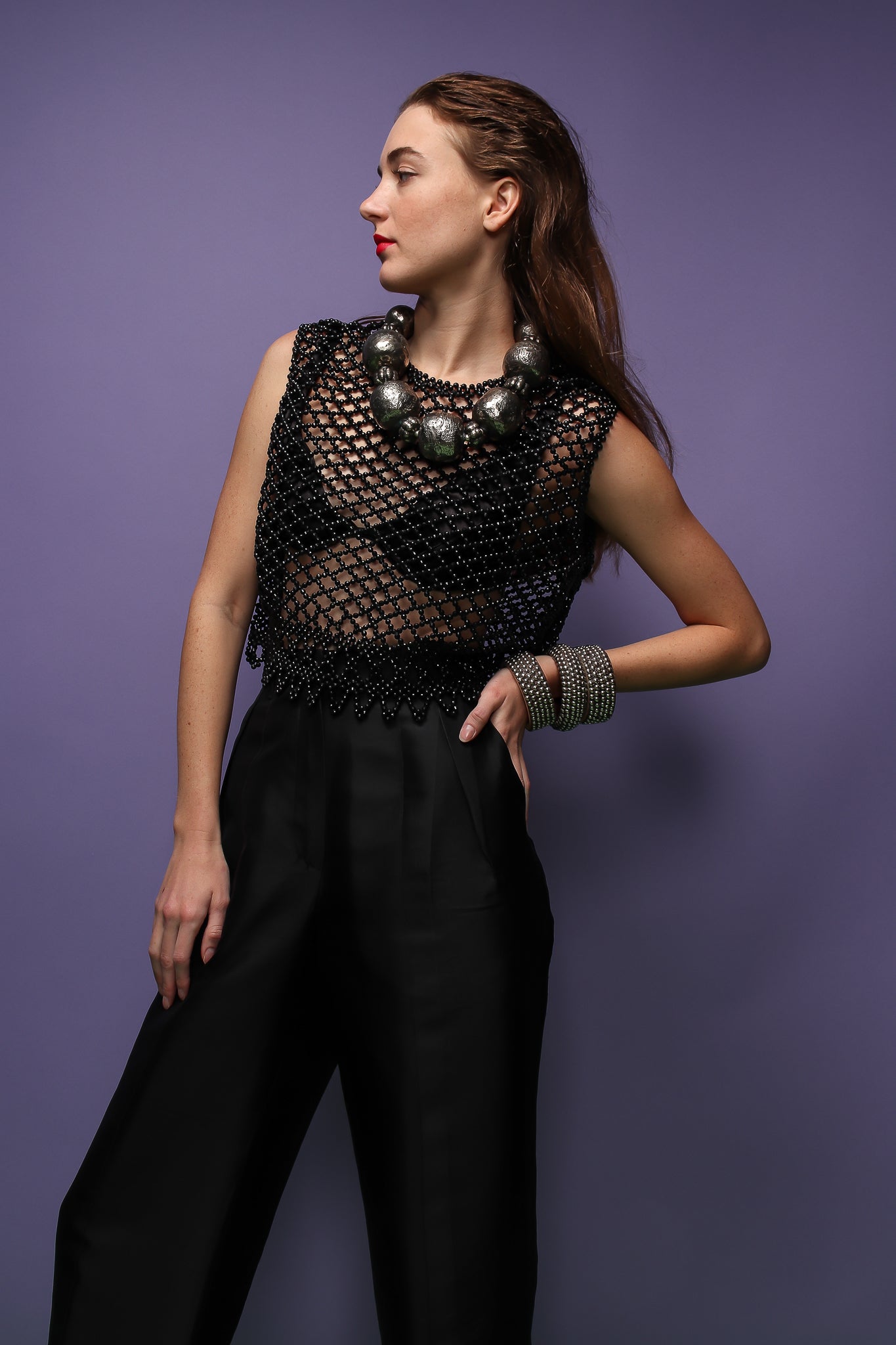 girl in black beaded top, jill sander pant, & beaded ball necklace at Recess Los Angeles