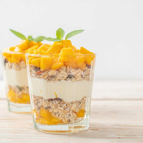 Tropical Muesli Cup lined with Oats, Yoghurt and Mango