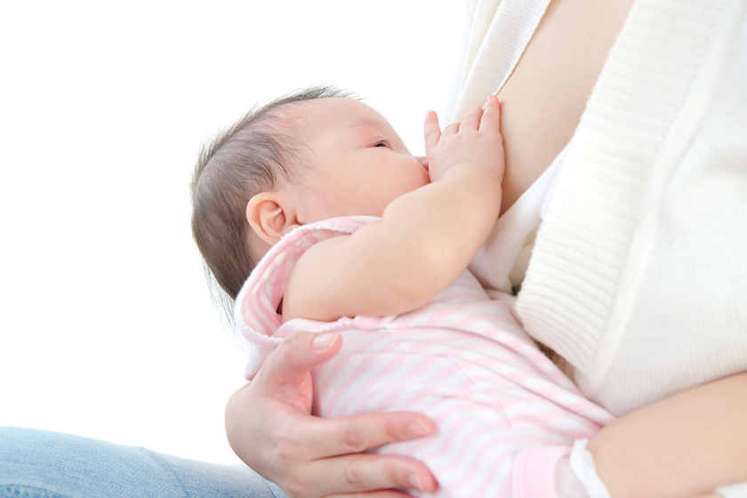 Baby nursing on mom