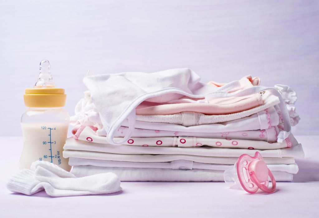 Stack of baby girls clothing