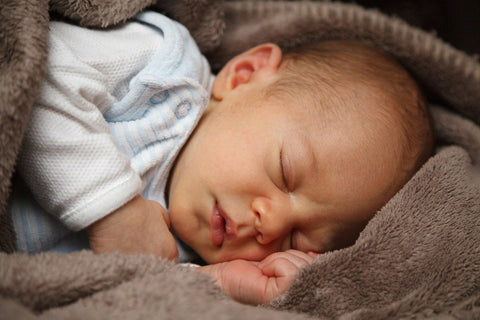 Baby sleeping in a blanket