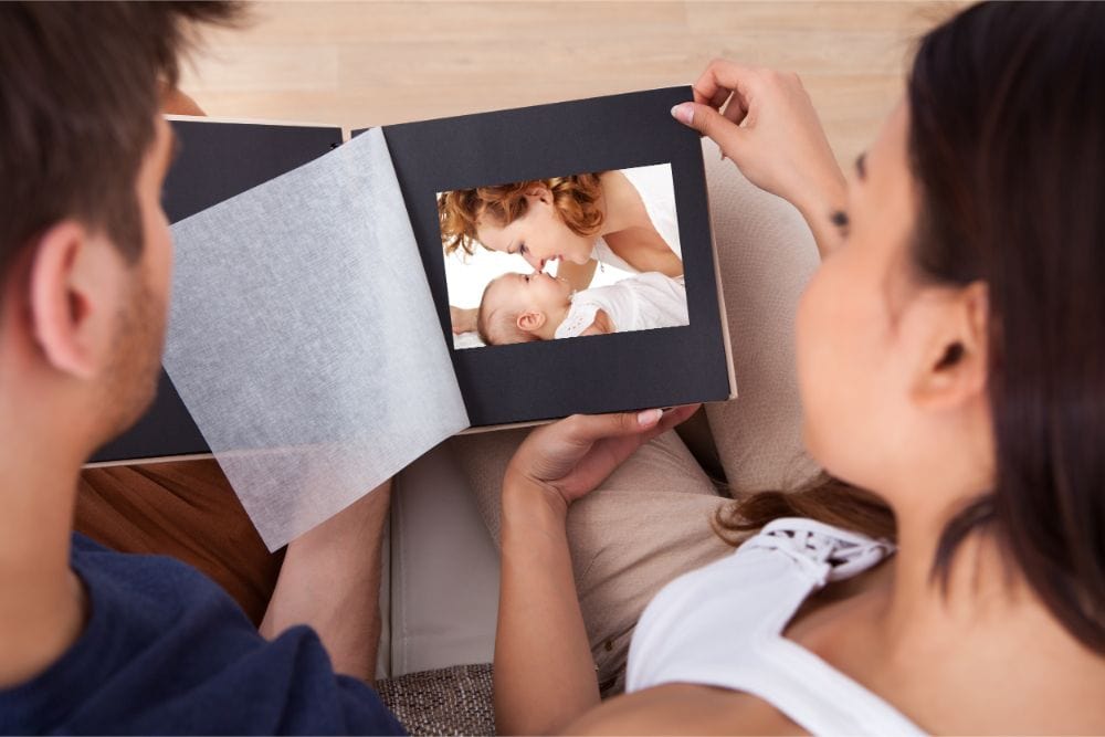 Couple looking through memory book