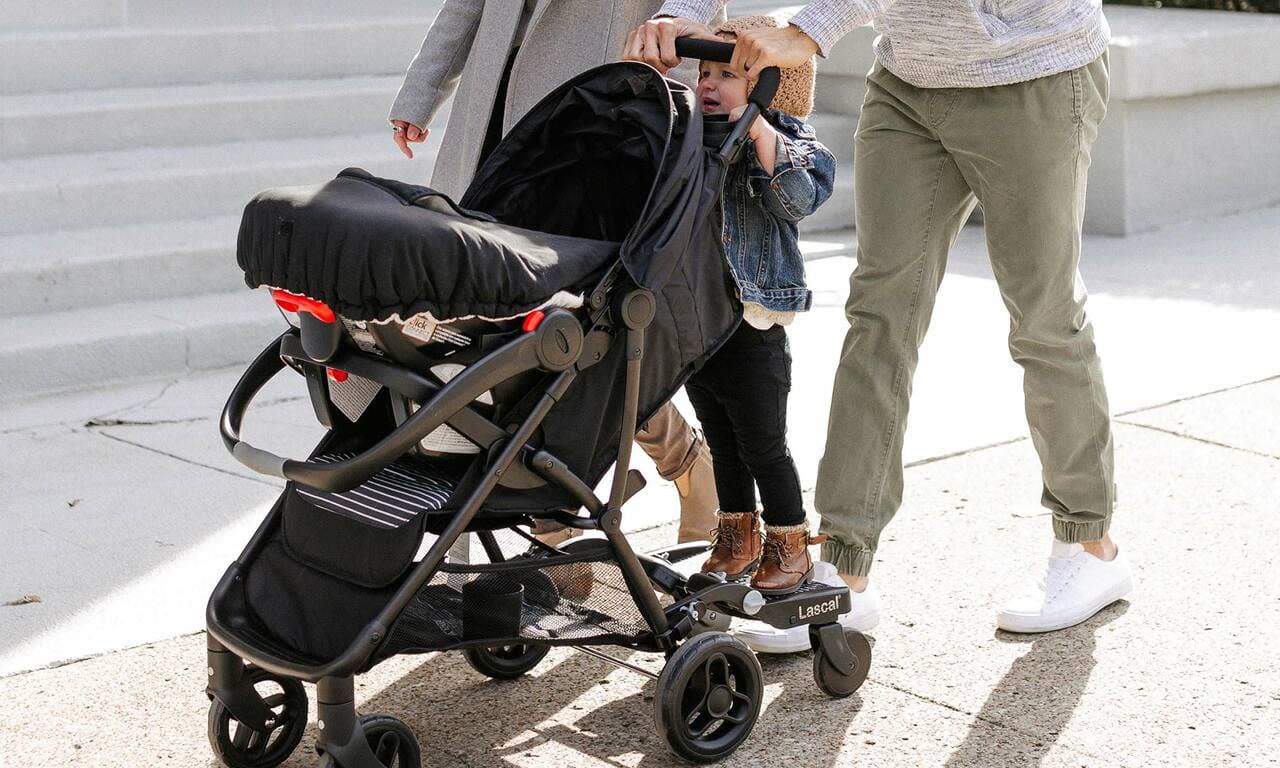 a child riding a stroller board