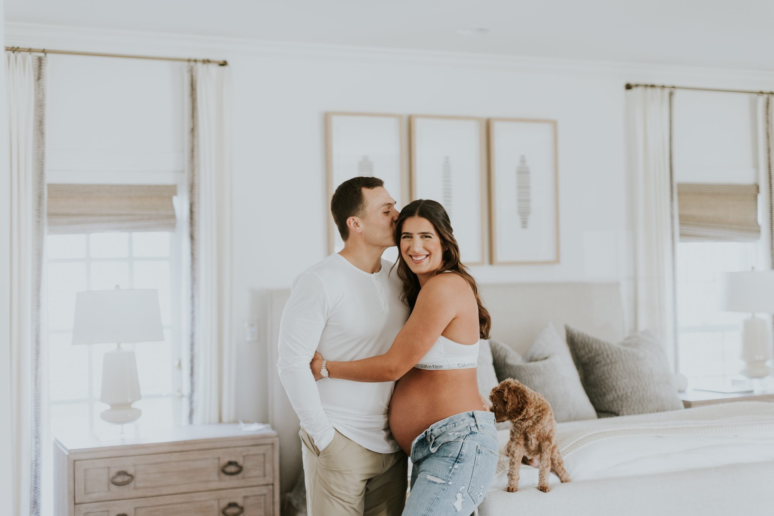 Pregnant couple in room