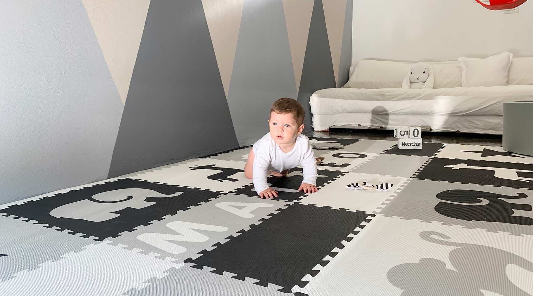 Baby on playmat