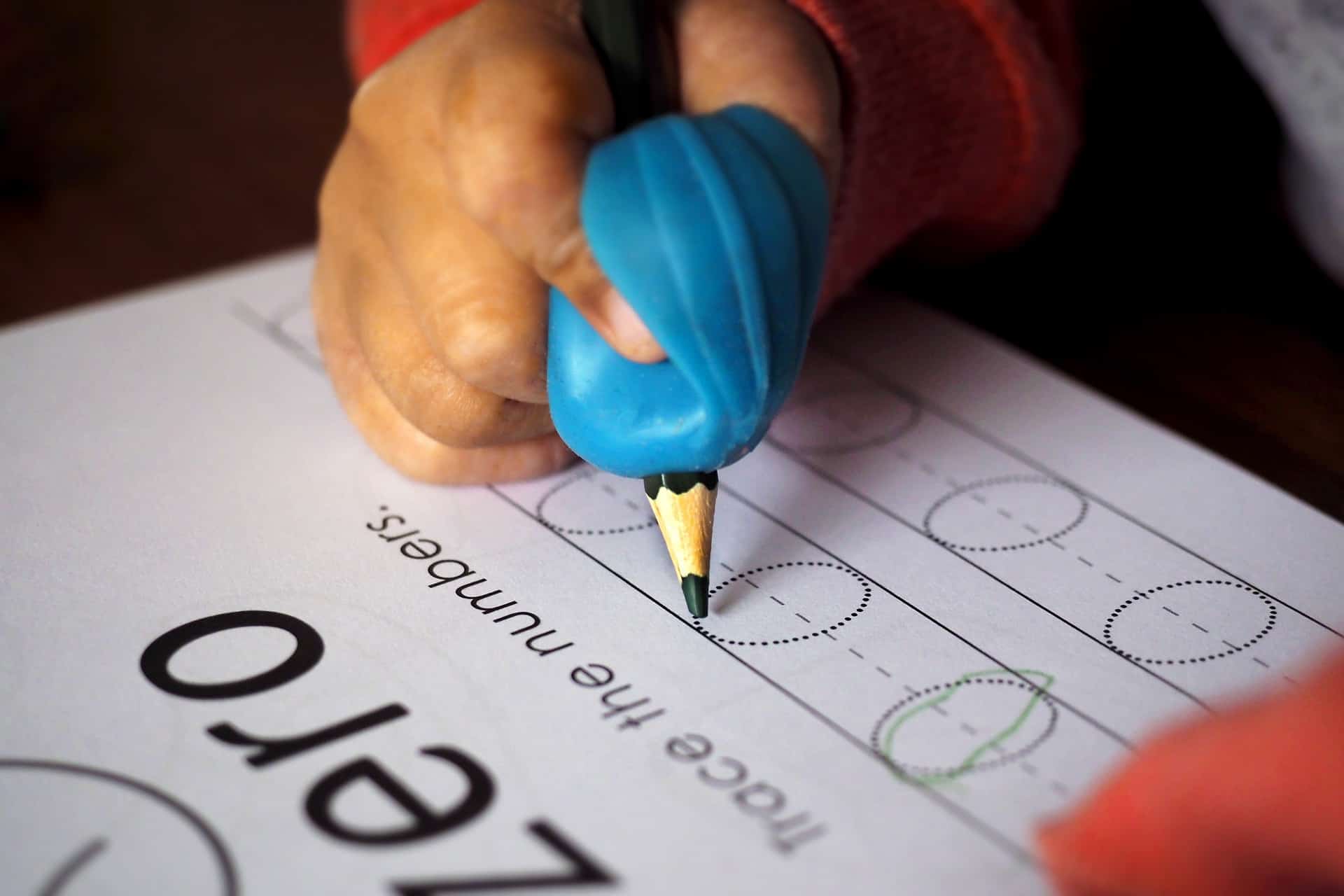 A Child Tracing Numbers