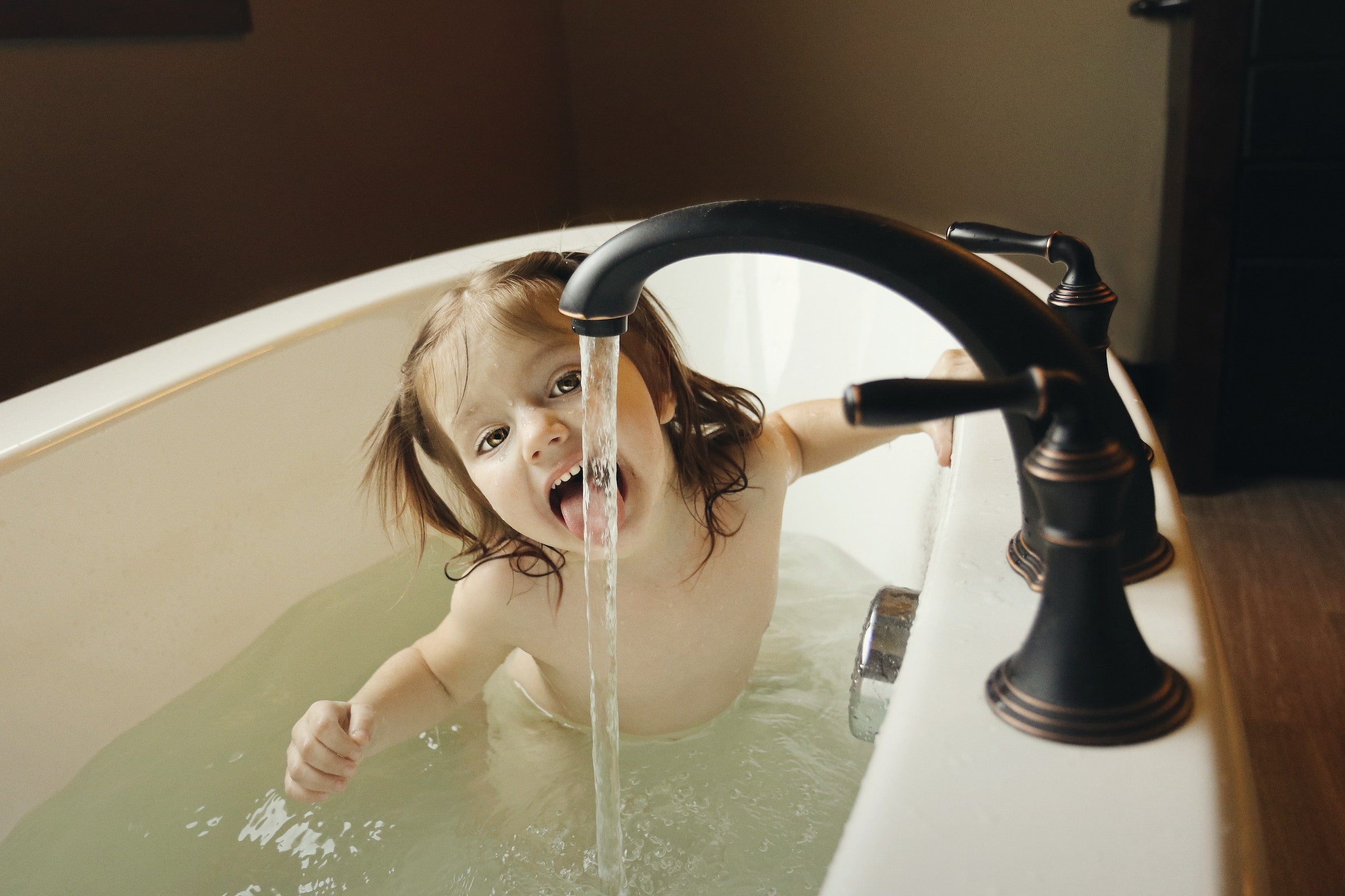  a baby in a bath