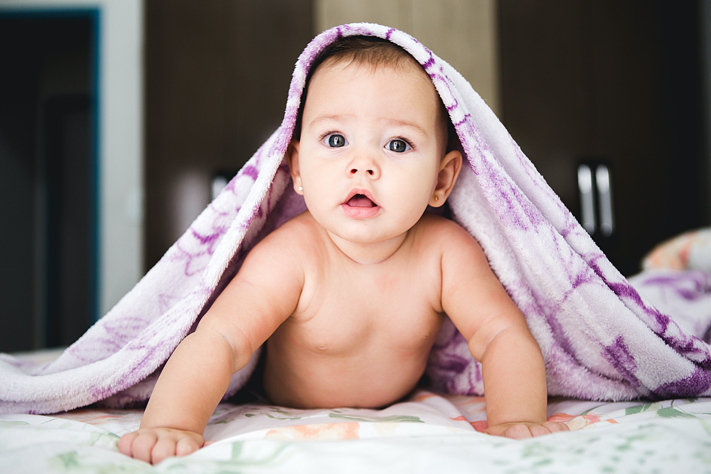 baby under a blanket