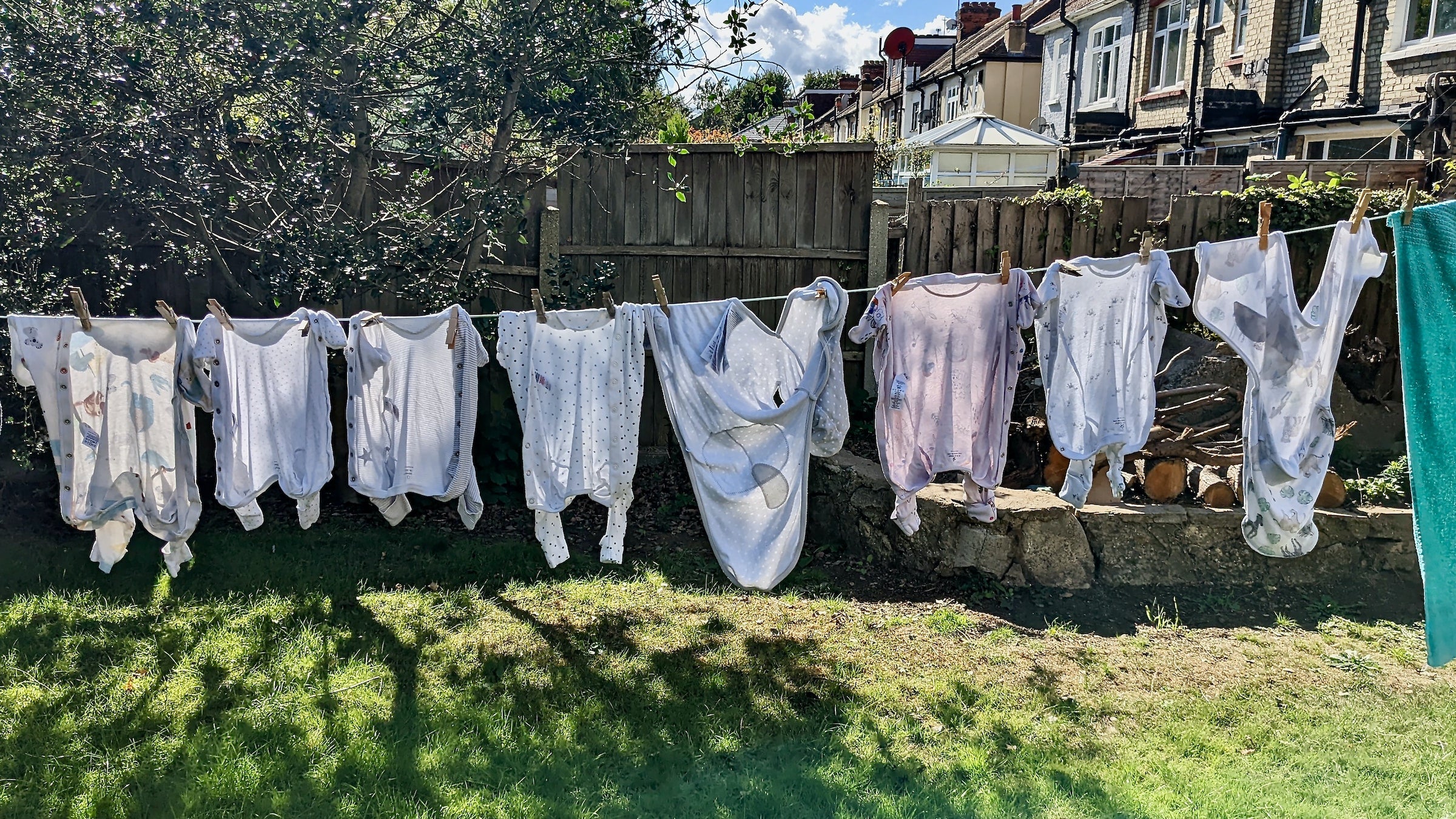 baby laundry drying on a clothesline