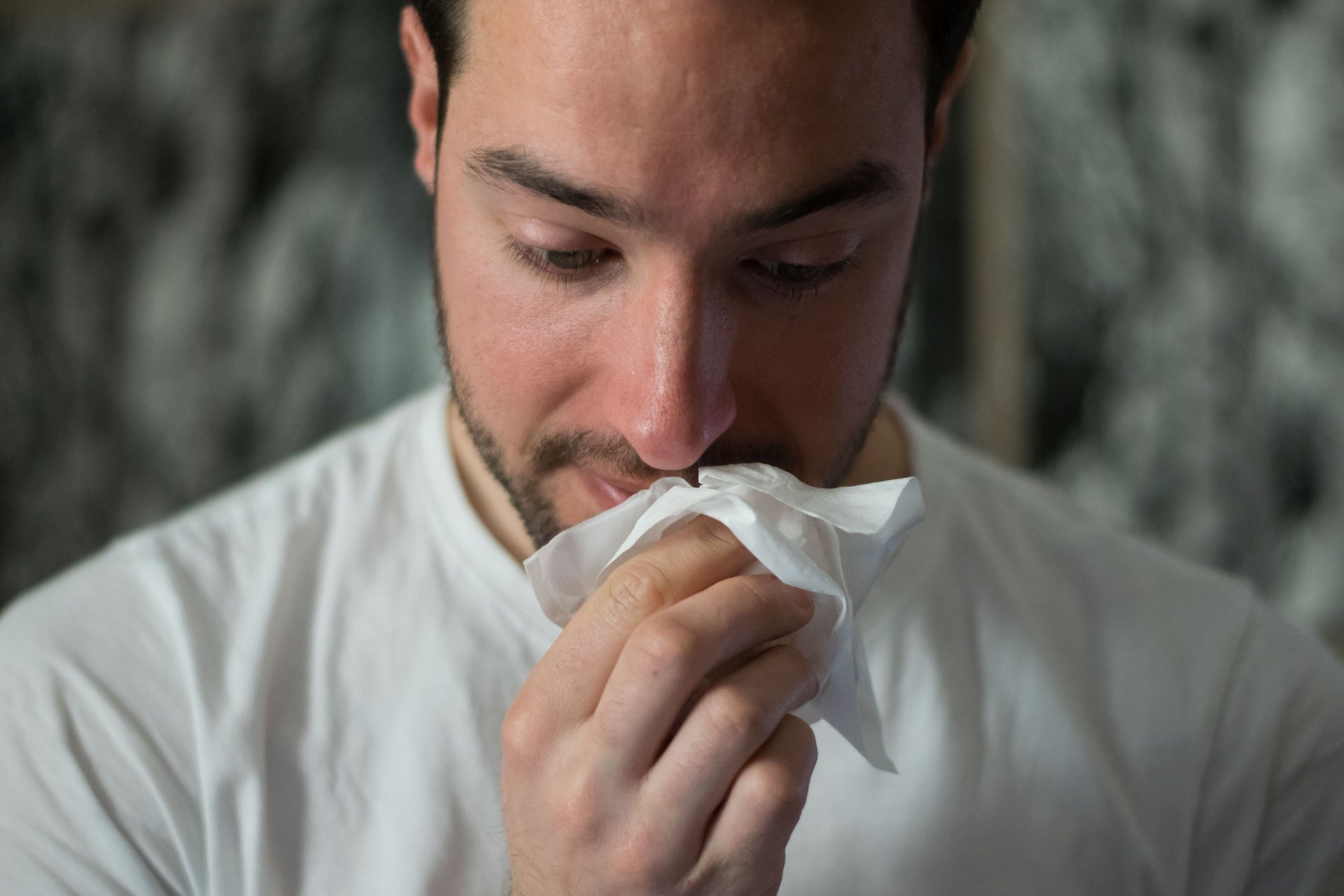 A person wiping his nose