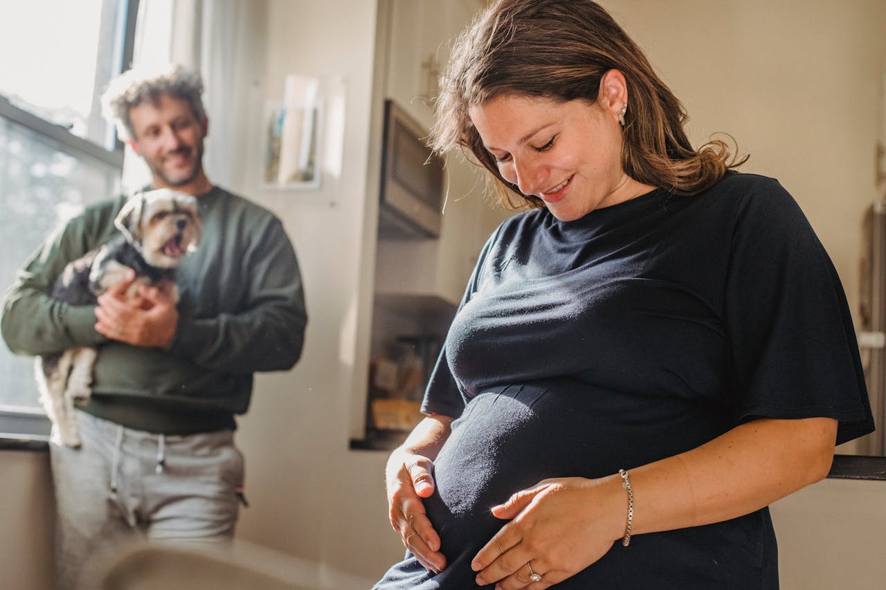 pregnant parent and dog