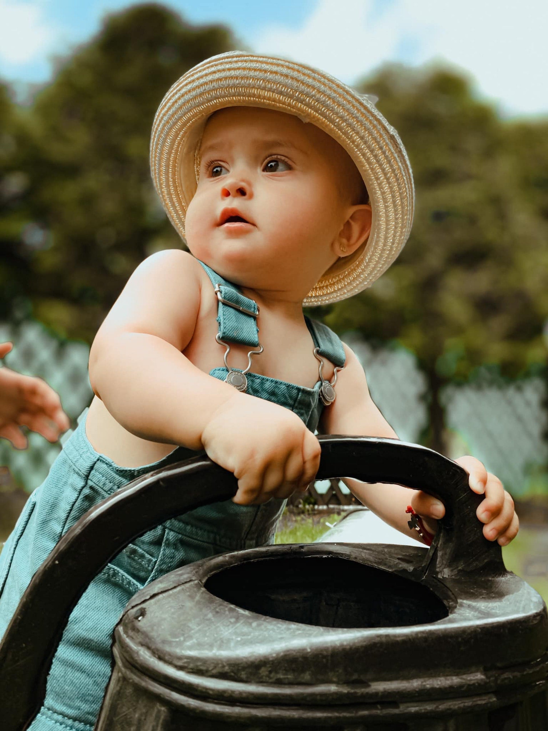 Baby outside in hat