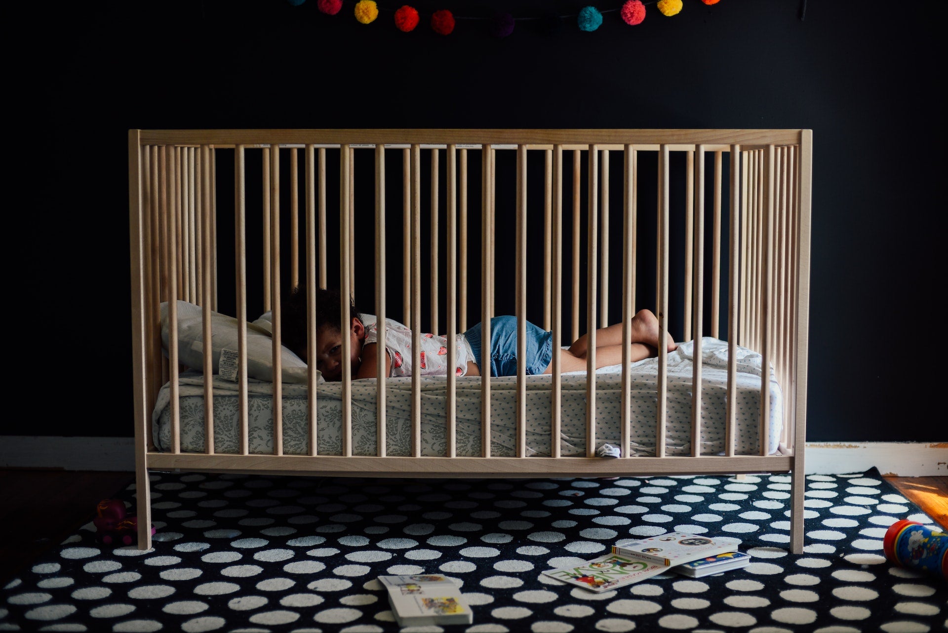 baby laying in a crib