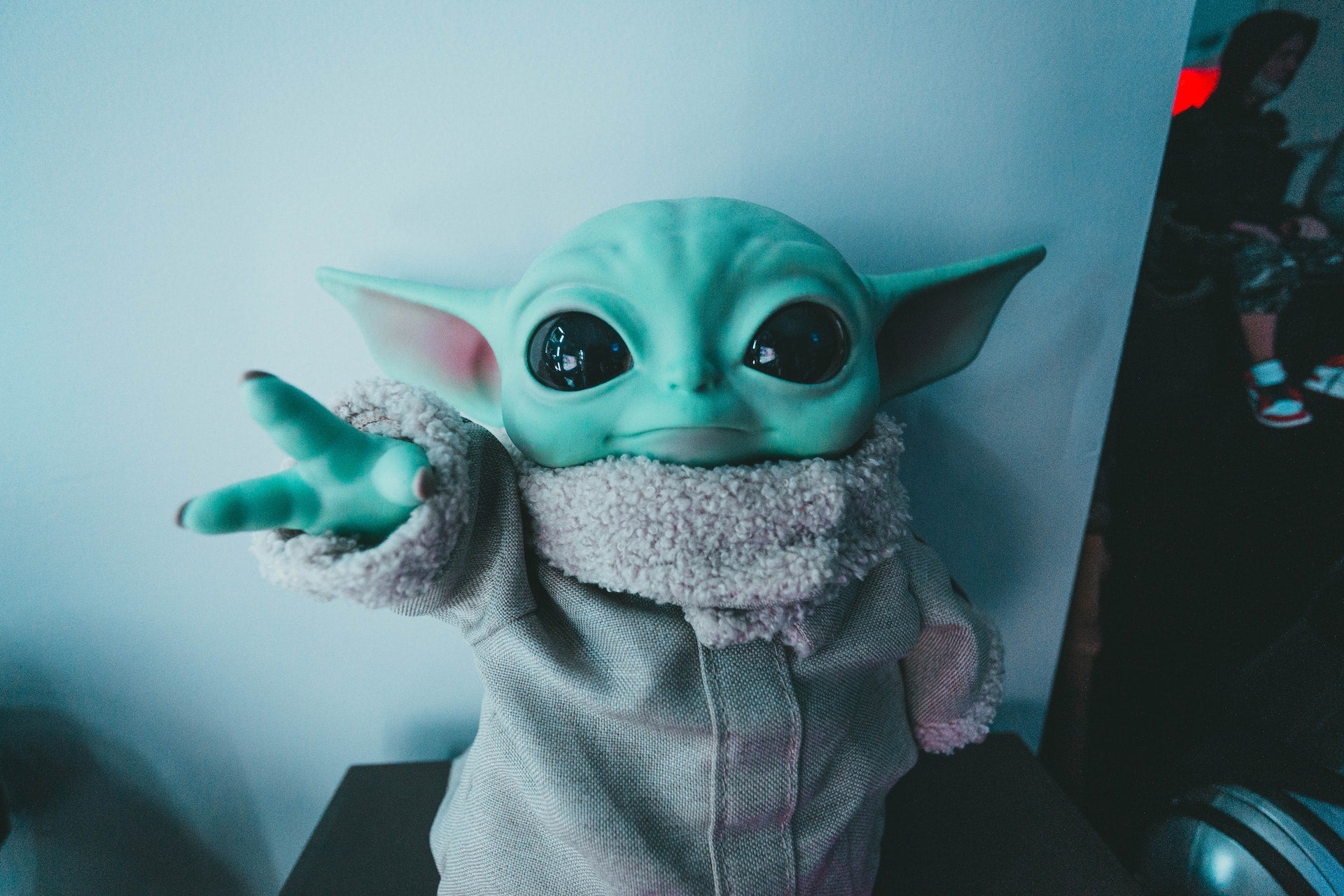 yoda doll in a baby’s room