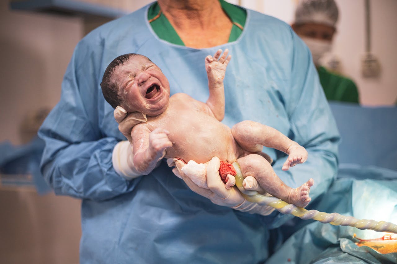 doctor holding baby