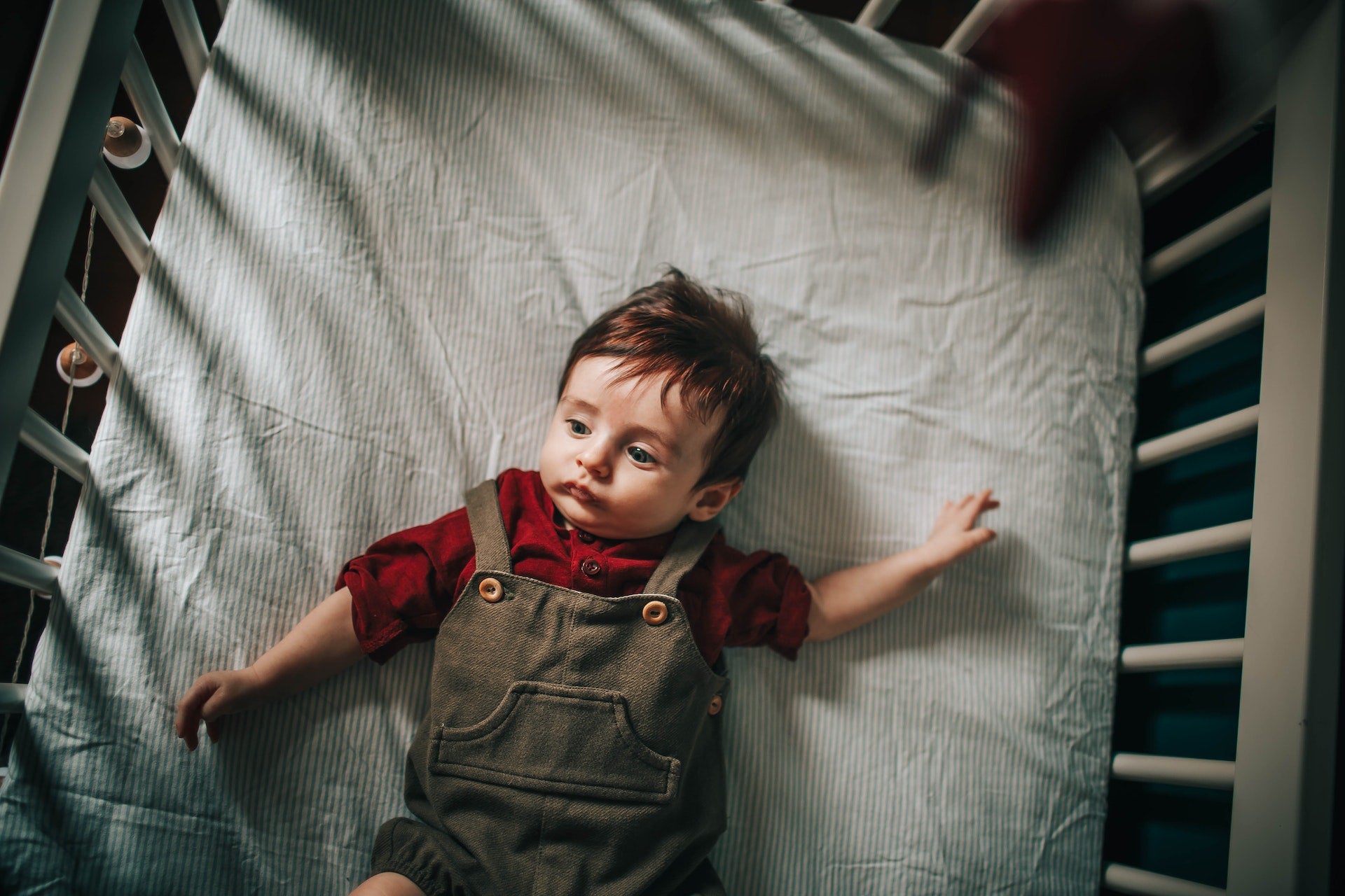 Boy in crib