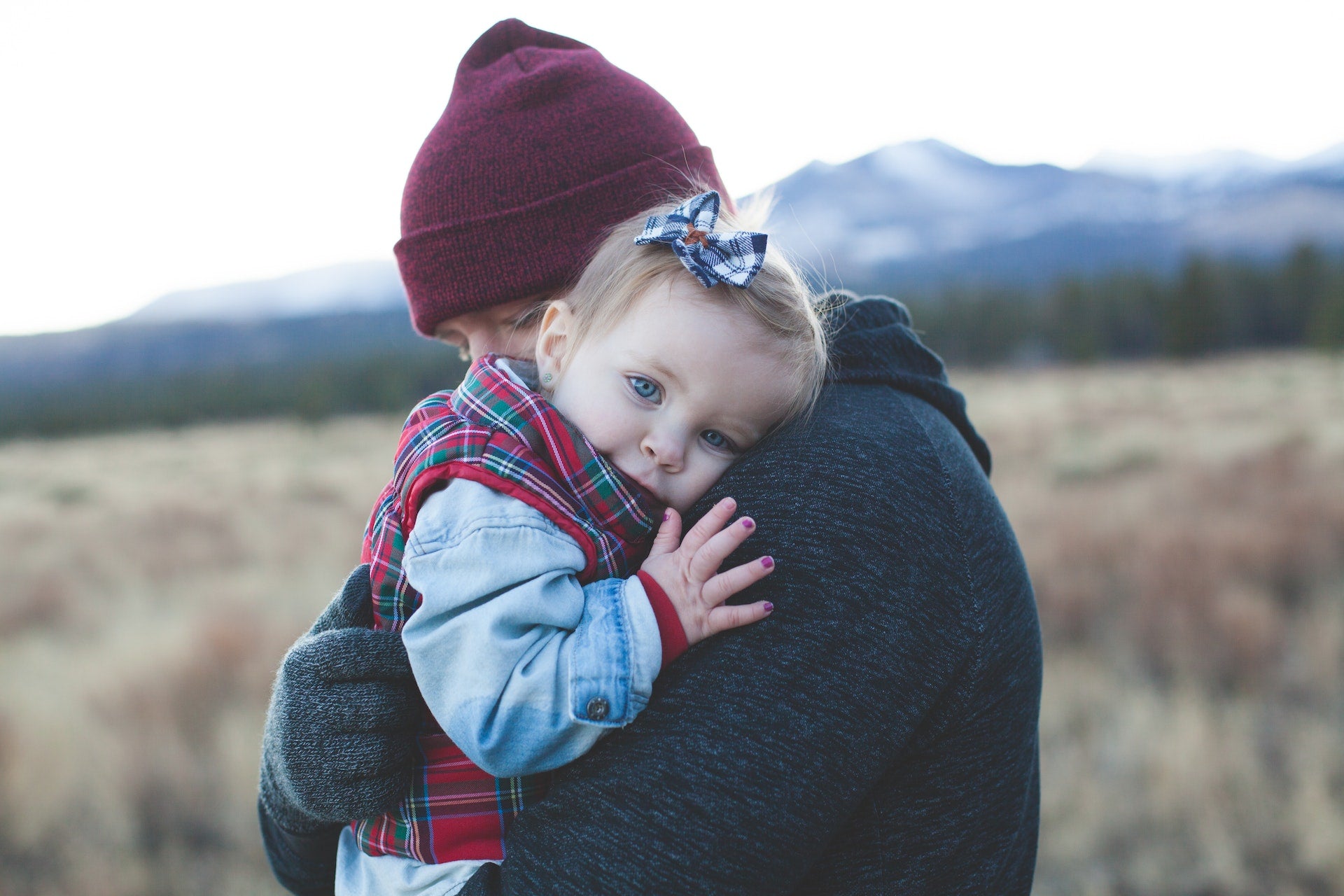 dad holding baby