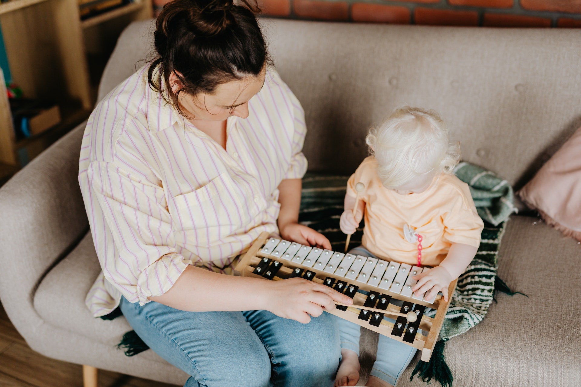 baby playing instrument