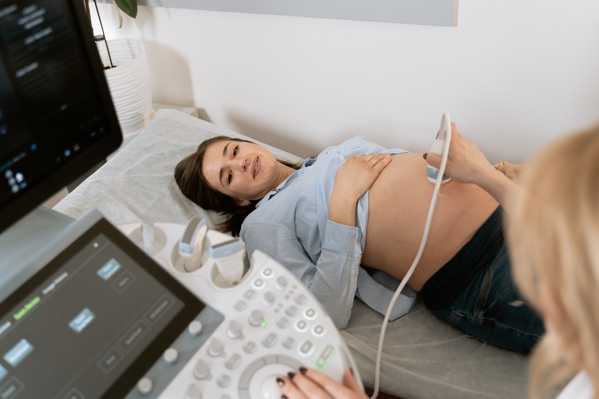 woman laying at a prenatal appointment