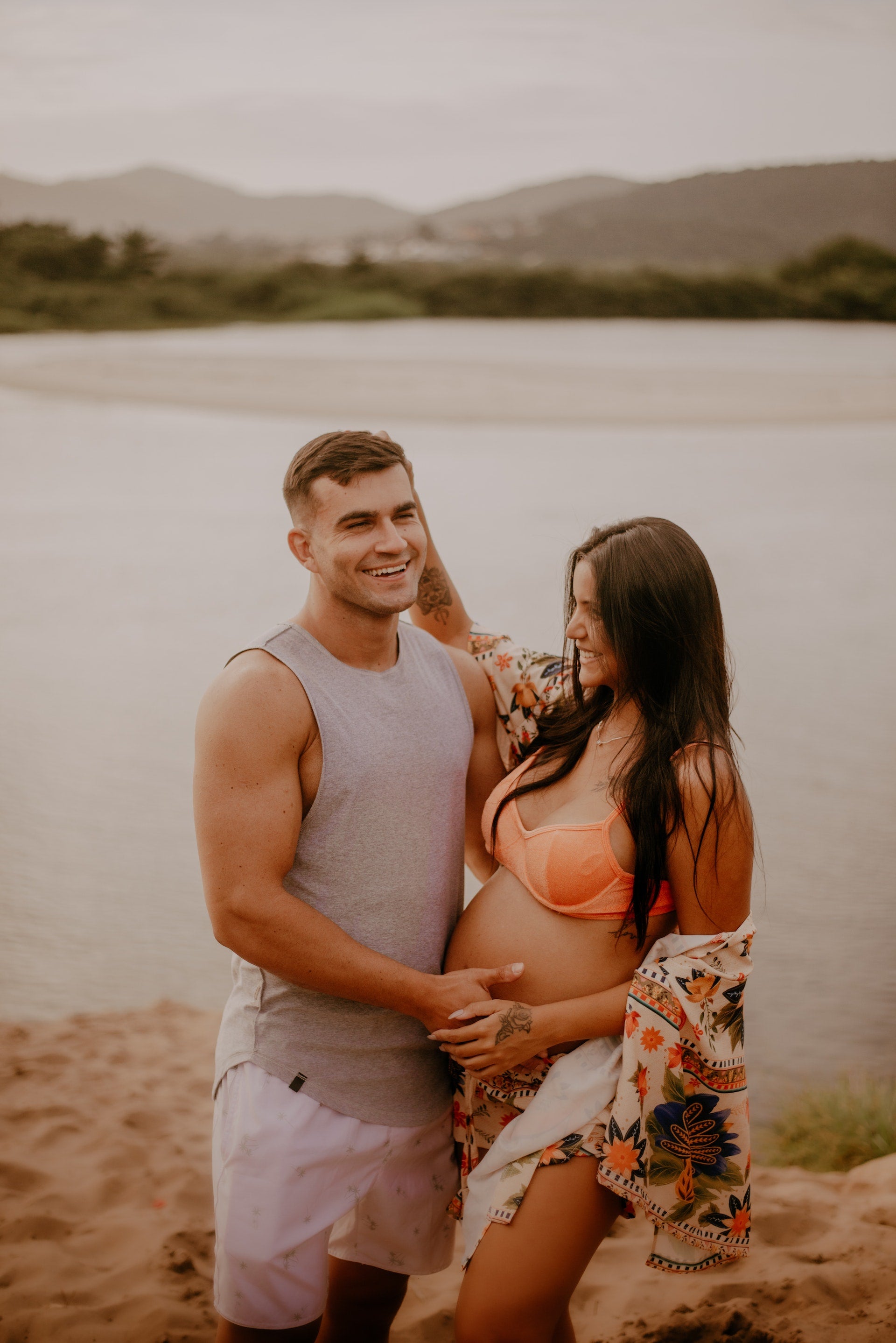 Pregnant couple smiling