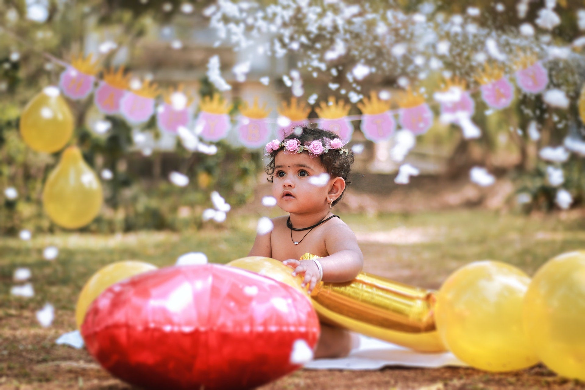 baby with flowers