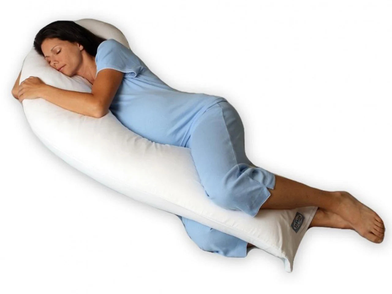 Woman with pregnancy pillow