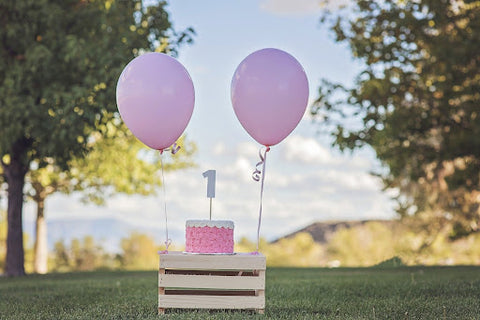 Keep the mess to a minimum by moving the cake celebration outdoors if you can.