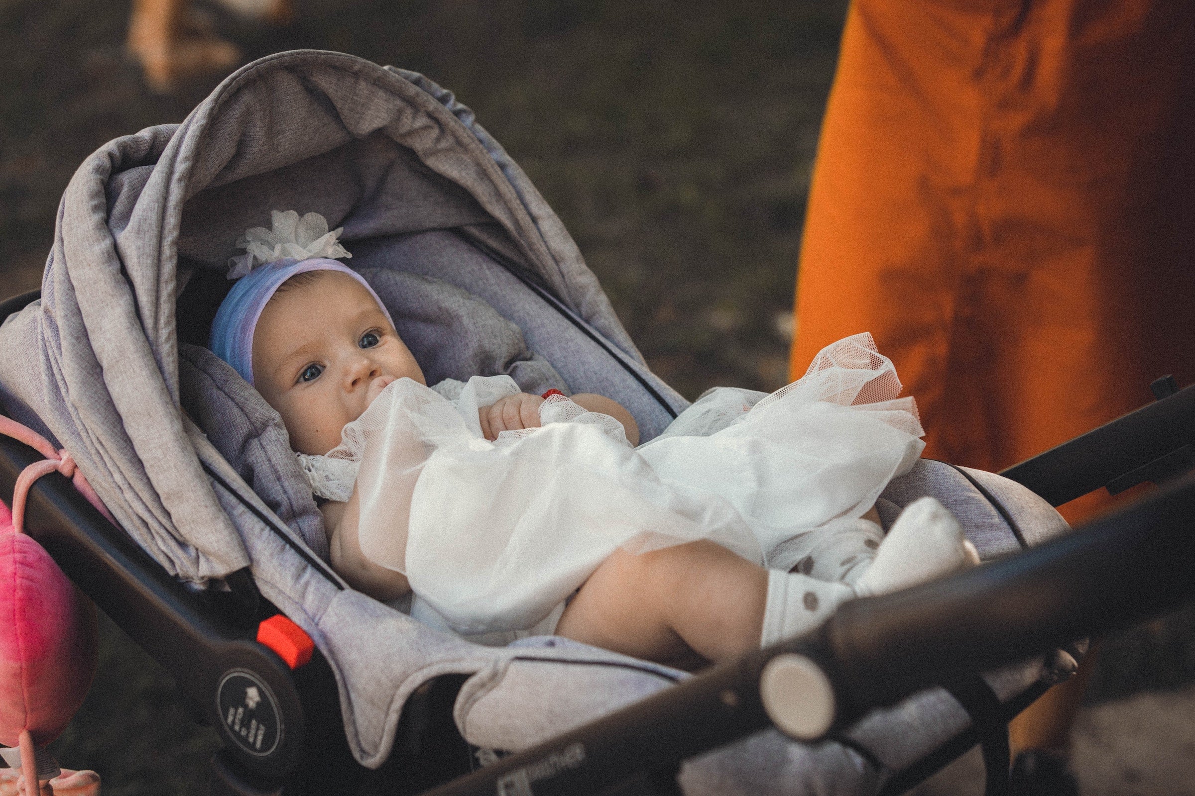 baby in a travel system