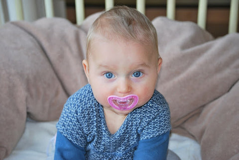 Sucking on a pacifier can calm a baby quickly.