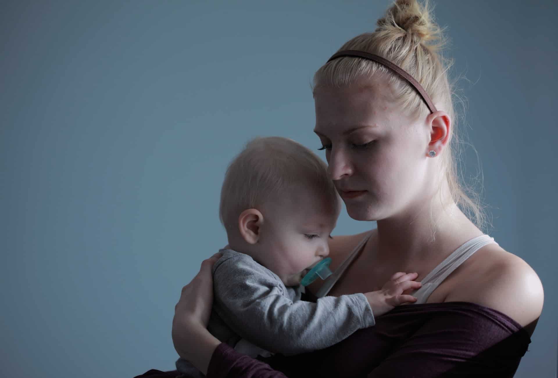 woman holding a baby